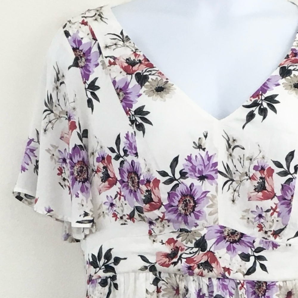 Torrid | Floral Shorts Romper with Open Front Skirt - Picture 3 of 9